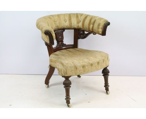 Victorian mahogany chair, the upper button back section above carved pierced back, incorporating a central monogram, on flute