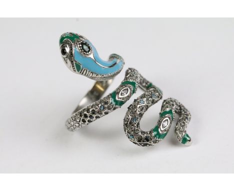 A ladies silver and enamel ring in the form of a snake, marked 925 to the shank. 