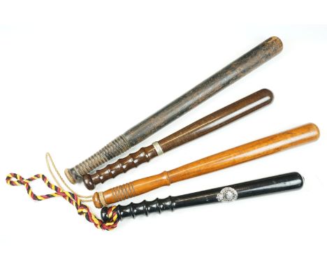 Four turned wooden truncheons to include an early 20th century example (with band inscribed Liverpool City Police Riots Augus