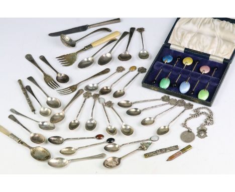 A collection of hallmarked silver and silver plated teaspoons and cuttlery to include a cased set of enamel spoons. 