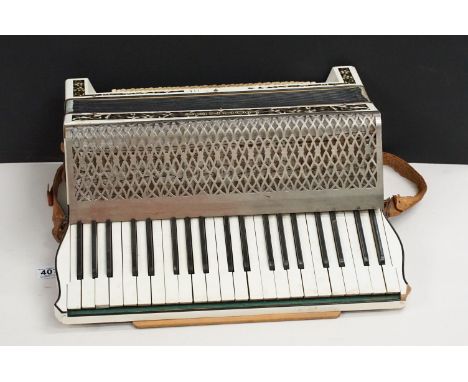 Hohner piano accordion, with 120 buttons and leather carry strap 