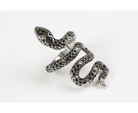 A ladies silver ring in the form of a snake, marked 925 to the shank. 