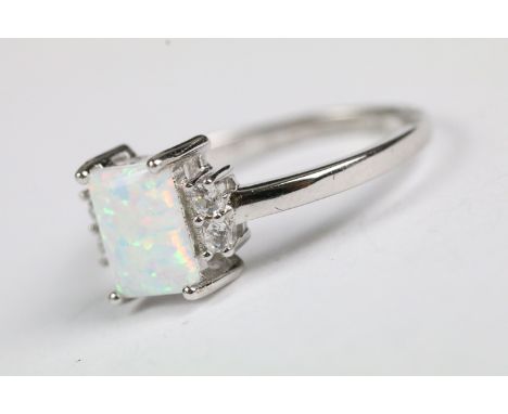 Silver CZ and opal paneled ring 