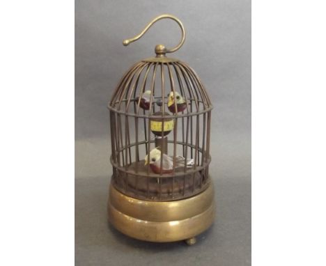 A brass bird cage automaton clock, 6½" high 