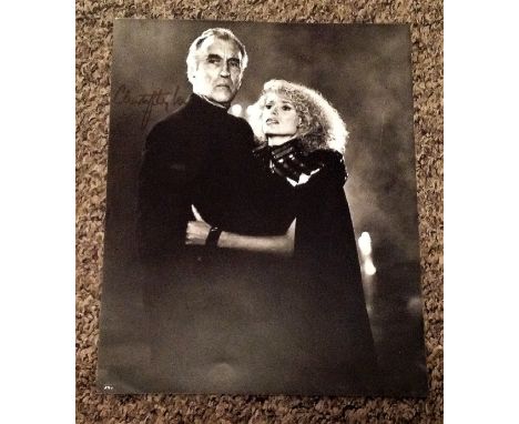 Christopher Lee signed 10x8 black and white pictured with Sybil Danning in the movie The Howling II. Sir Christopher Frank Ca