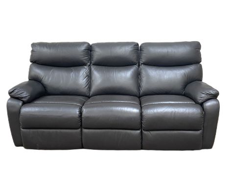 A modern three seat black leather reclining sofa, with two adjustable foot rests