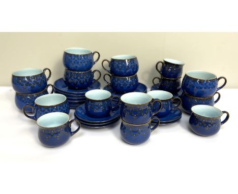 A Denby china part dinner service, in Royal blue with stylised flower decoration, with various cups and saucers etc. (a lot)