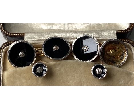 A pair of Gentleman&rsquo;s 18 carat gold and platinum cuff links, each with diamond centre stud, also a pair of 9 carat gold