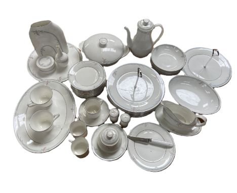 A Royal Doulton 'Carnation' pattern bone china part tea and dinner service, including a coffee pot, cake stands, various dish