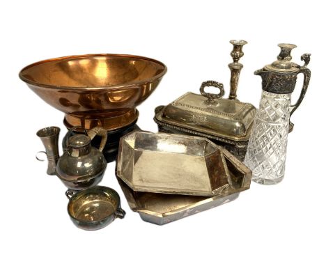 Assortment of silver plate, including a pair of candlesticks, a claret jug, two covered entree dishes and a large copper basi