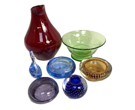 Assorted coloured glassware, including a large vintage ruby glass water jug, and blue decorative glass swan etc. (a lot)