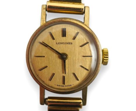 A lady's modern gold Longines manual wind wrist watch, on an Italian 18k gold bracelet, overall 16.5cm, gross weight 20.4 gra