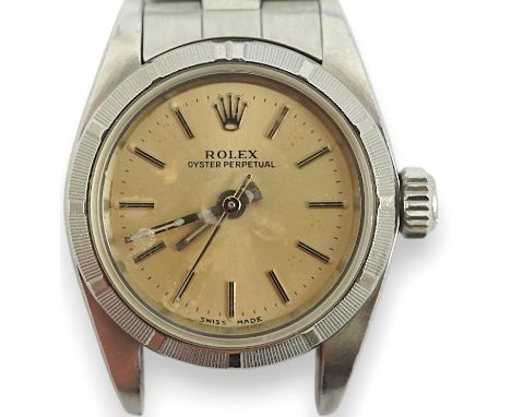 A lady's 1990's stainless steel Rolex Oyster Perpetual wrist watch, on a stainless steel Rolex bracelet, with baton numerals,