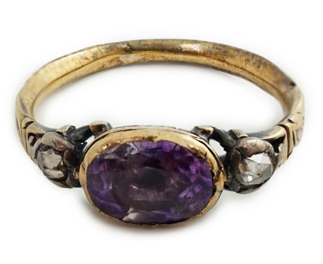 A George III gold, single stone foil backed amethyst and two stone rose cut diamond set  memorial ring inscribed to the outsi