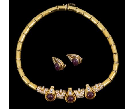 A modern 18k gold, cabochon ruby, round and baguette cut diamond cluster set torque  necklace and a pair of matching earrings