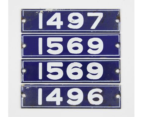 Set of London Underground enamel stock-number plates. Central Line 1962. Comprising one matching pair (1569) and nos. 1496 an