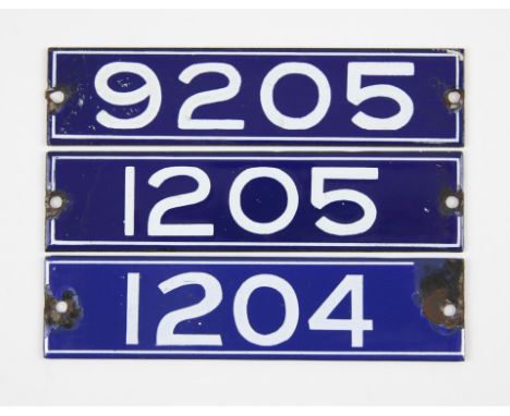 Set of London Underground enamel stock-number plates, from 1959. Nos. 1204, 1205, 9205. (3). Provenance: The vendor worked on