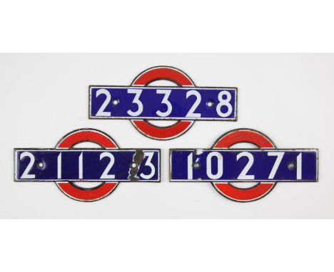 Set of London Underground enamel 'bull's eye' stock-number plates. Comprising 1938 Bakerloo Line (10271), R47 non-driving mot