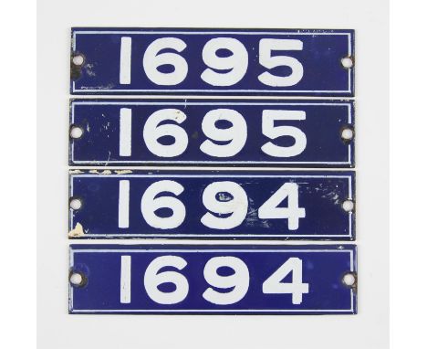Set of London Underground enamel stock-number plates. Central Line 1962. Comprising two matching pairs (1694 and 1695). (4). 