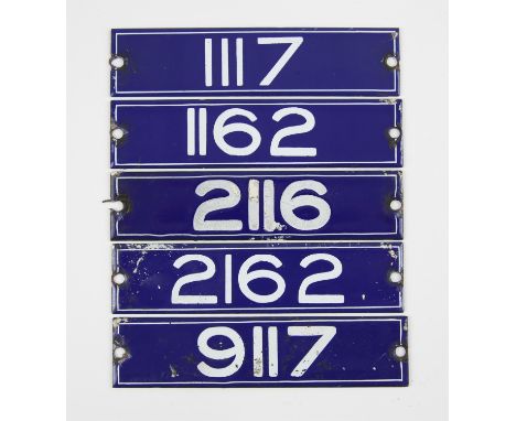 Set of London Underground enamel stock-number plates, from 1959. Nos. 1117, 1162, 2116, 2162, 9117. (5). Provenance: The vend