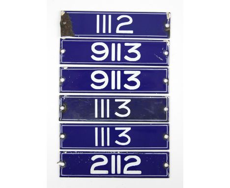 Set of London Underground enamel stock-number plates, from 1959. Two matching pairs (1113 and 9113), and nos. 1112 and 2112. 