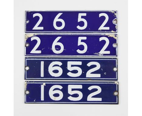 Set of London Underground enamel stock-number plates, from 1962 Central Line. Matching pairs (1652 and 2652). (4). Provenance