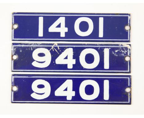 Set of London Underground enamel stock-number plates, from Central Line 1962. One matching pair (9401), and no. 1401. (3). Pr