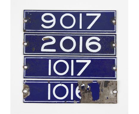 Set of London Underground enamel stock-number plates from 1959. Nos. 1016 (badly damaged), 1017, 2016, 9017. (4). Provenance: