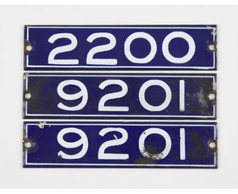 Set of London Underground enamel stock-number plates, from 1959. One matching pair (9201), and no. 2200. (3). Provenance: The