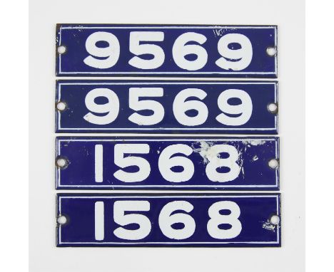 Set of London Underground enamel stock-number plates. Central Line 1962. Comprising two matching pairs (1568 and 9569). (4). 