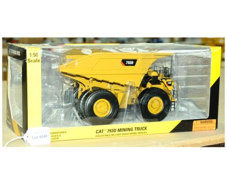 Norscot, a boxed 1:50 scale commercial plant model 55174 CAT 793D Mining Truck. Condition appears to be Good although not che