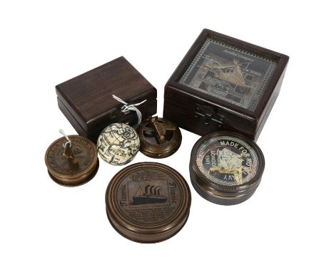 A group of 3 brass compasses, 1 compass in presentation box with narrative regarding The Titanic, and a boxed sextant, a boxe