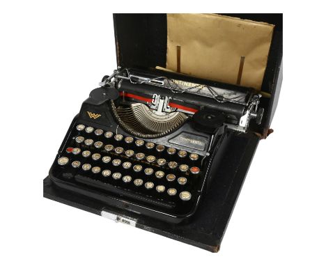 An early 20th century Continental typewriter, with key-set tabulator operated from front of the machine, made in Saxony, case