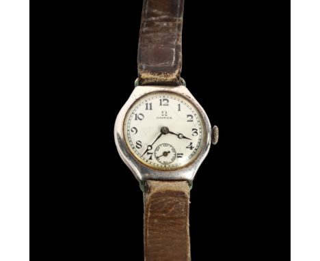 OMEGA - an early 20th century lady's silver mechanical wristwatch, circa 1925, white dial with Arabic numerals, blued steel h