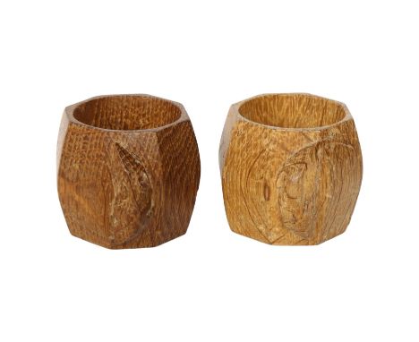 ROBERT MOUSEMAN THOMPSON - pair of canted oak napkin rings with carved mouse, H5cmBoth in good overall condition, 1 has some 