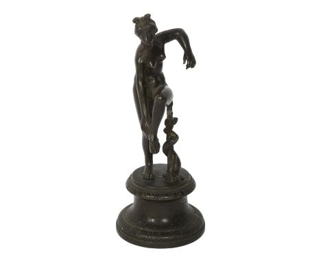 A small patinated spelter figure "Aphrodite adjusting her sandal", on stand, H18.5cmFigure is good overall condition, some ob