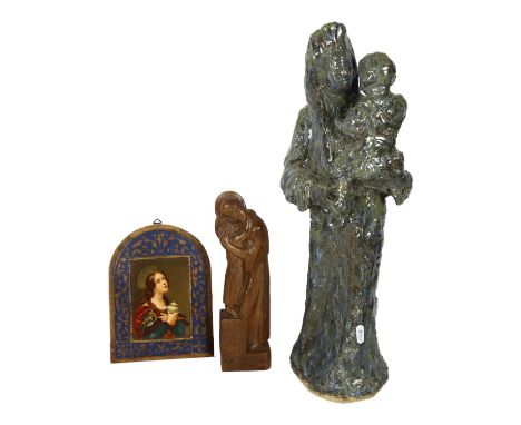 A carved wood sculpture of St Joseph, H27cm, a glazed Studio pottery Madonna and child, and a religious portrait print 