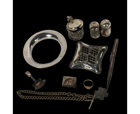 A group of silver items, to include a 3-piece cruet set, an envelope stamp case, shovel design caddy spoon, silver-mounted pi