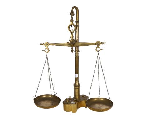 A large pair of Antique brass Continental scales with fitted weights in base, H58cm 