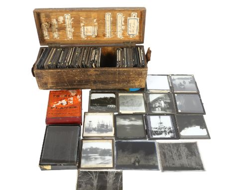 A box of Antique glass magic lantern slides, slides cover various subjects including many nautical and general social history