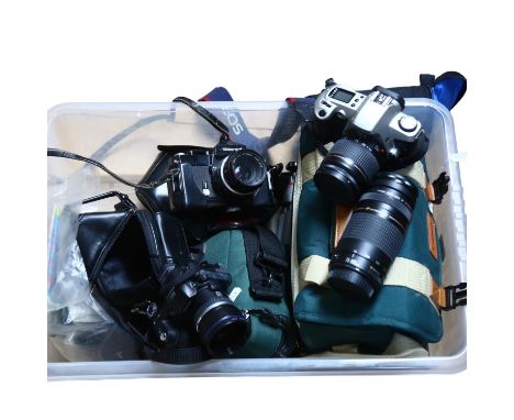 A quantity of Vintage cameras, lenses, and associated equipment, including a Nikon Nikkormat camera, FT4680977, a Canon zoom 