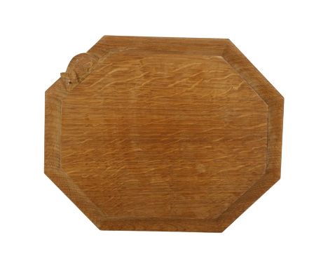 ROBERT MOUSEMAN THOMPSON - an oak octagonal bread board with carved mouse, W31cmGood overall condition, general surface scrat