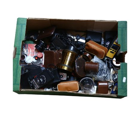 A quantity of Vintage camera accessories, including a Nikon El-Nikkor 75MN1:4 enlarger lens, and various other light meters a