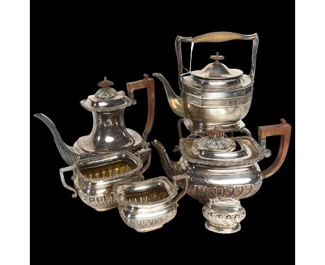 A silver plated 4-piece tea and coffee set of half fluted form, a spirit kettle on stand, and a Ronson Crown table lighter 