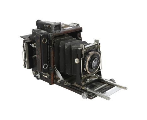 F.Deckel-Munchen, a Compur Speed Graphic folding camera, with a Kalart Sychronised Rangefinder 