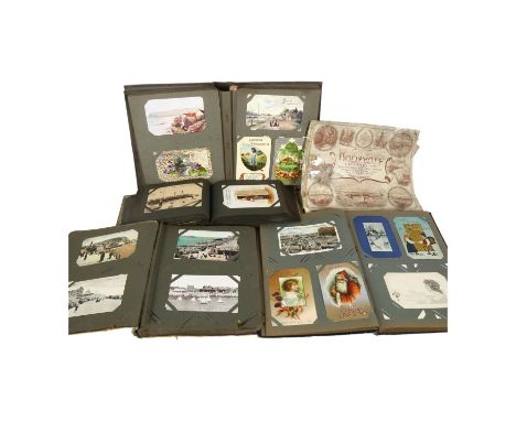 4 early 20th century postcard albums, some containing local postcards including Winchelsea Hastings, worldwide and topographi