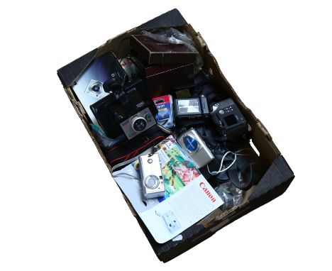 A quantity of of Vintage cameras and associated equipment, including a Sanyo VPC-W800 digital camera, a Canon Powershot A400 