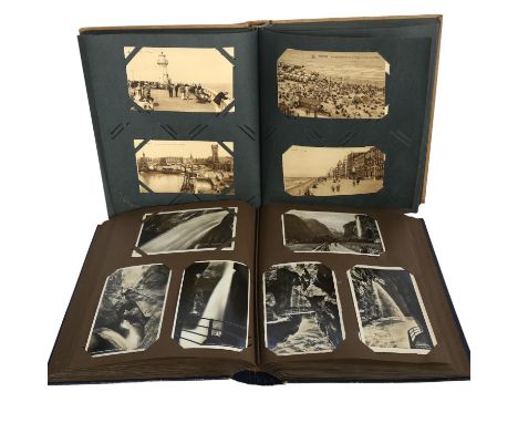 An album of Vintage French postcards, and another postcard album 