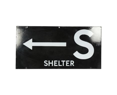 A black and white enamel sign "Air Raid Shelter", W61cm 