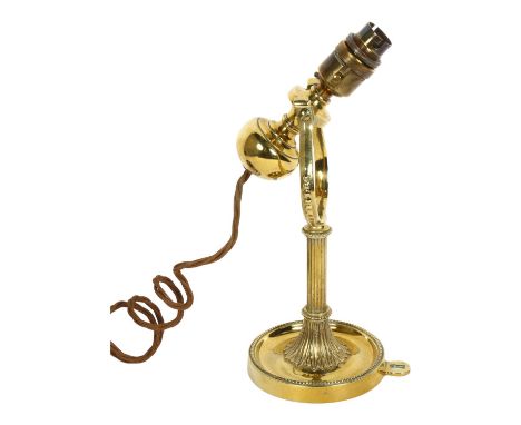 A polished brass gimballed wall light, H30cm 